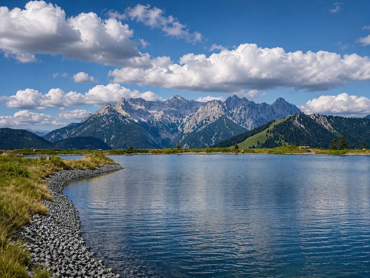 Rugged Alpine peaks, green forests, clear lakes and waterfalls around Saalfelden